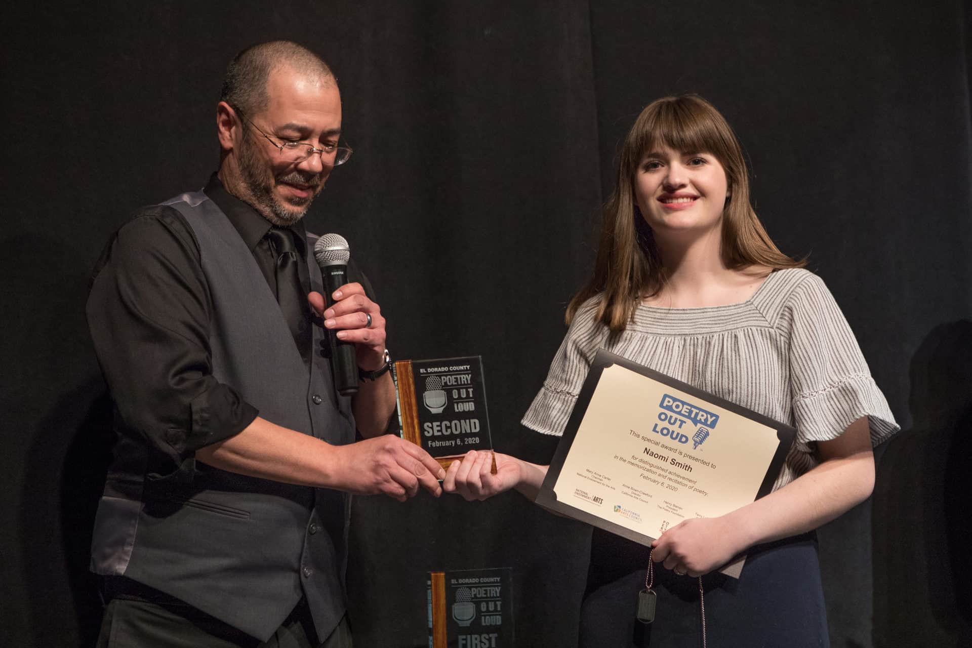 Naomi Smith receives her Second Place Award from Andrew Vonderschmitt