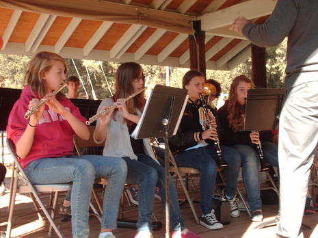 Students practice with instruments given by the Divide Music Coalition