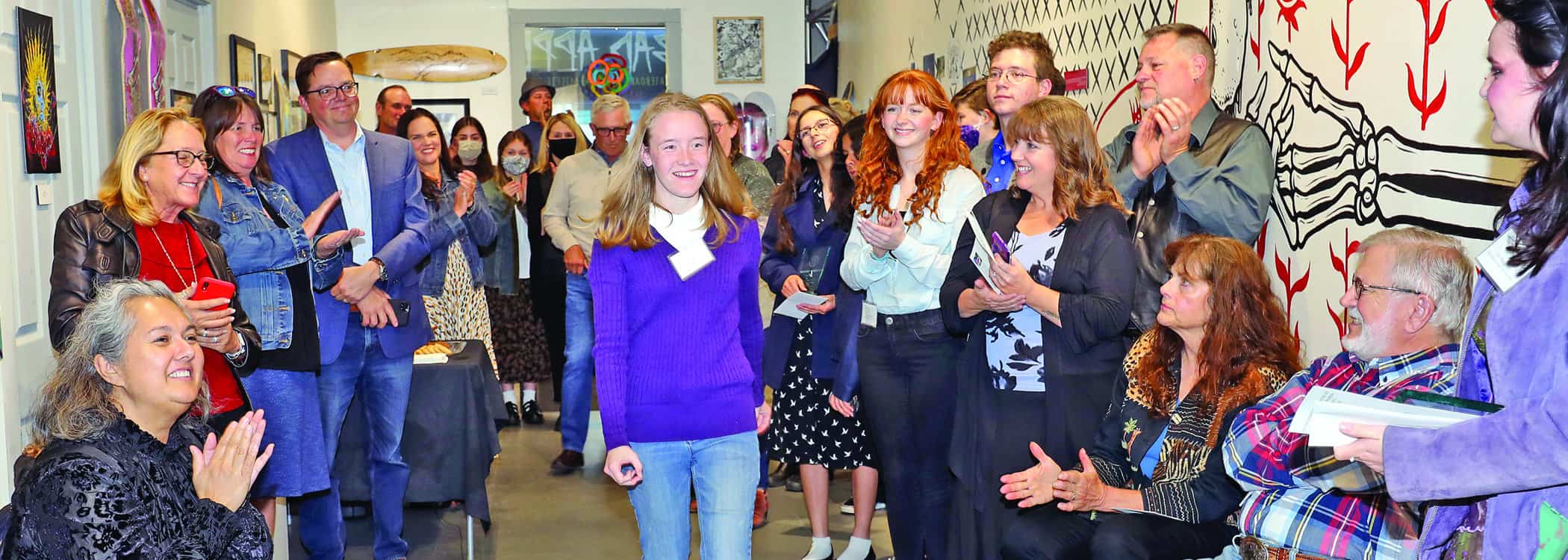YAA 22 banner Dae Larkin receiving the 2022 Joey Cattone Award for Visual Art. Photo: Shelly Thorene